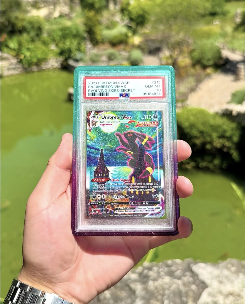 astro_degens's tweet photo. GIVING AWAY this $16,500 PSA 10 GEM MINT Umbreon VMAX Alternate Art #215 from Evolving Skies 

One of the most iconic modern Pokémon cards ever made. The artwork, the Umbreon, the Moon absolute grail status. 

I’ve got this beauty and I want to put it in the hands of one lucky Pokémon fan. ❤️

Valued at $16,500 and it could be yours.

Just Follow, LIKE + REPLY for your chance to WIN. Good luck, Trainers!