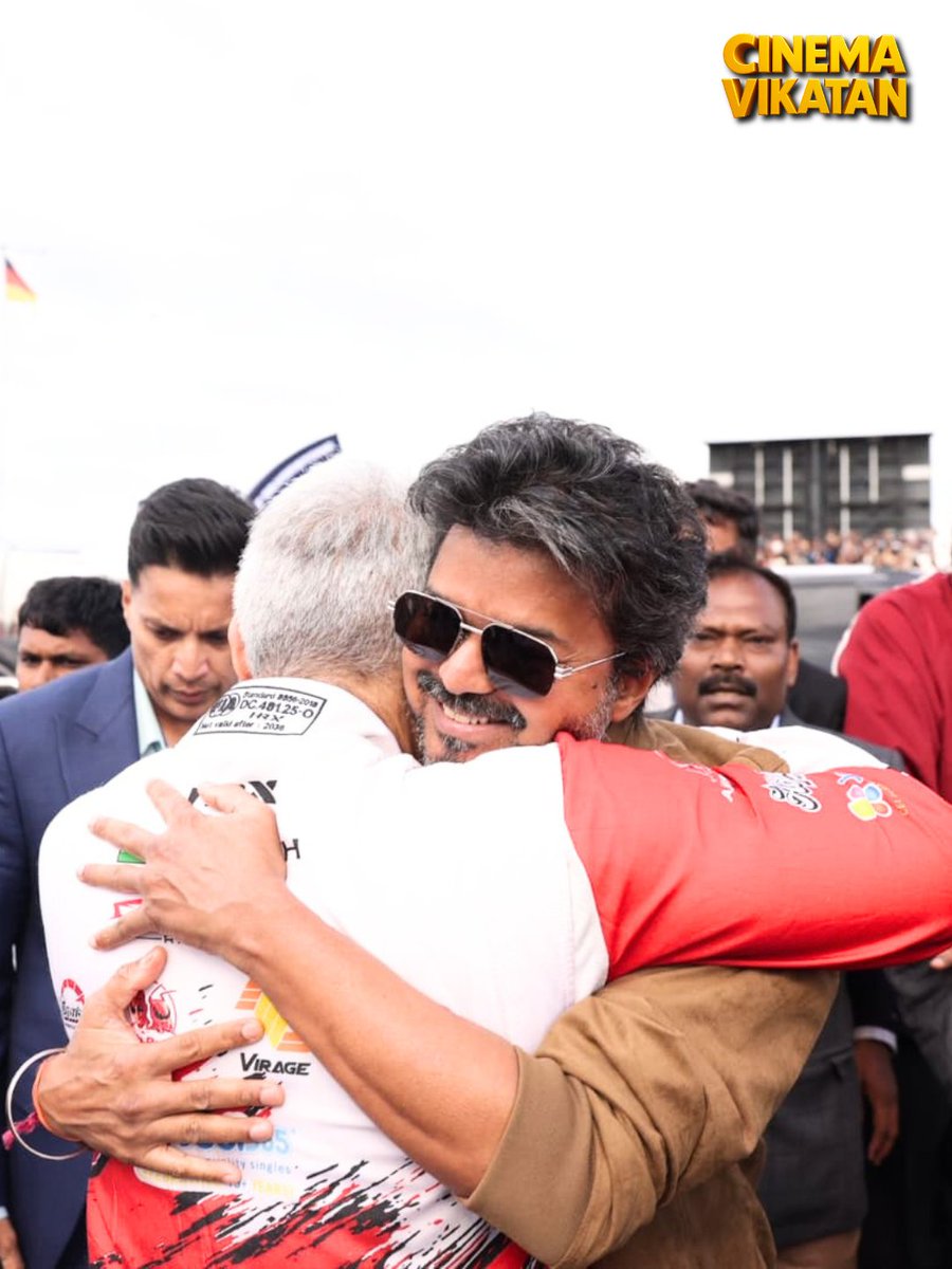 CinemaVikatan's tweet photo. Chief Minister Vijay meets Actor/Racer Ajith at the Silverstone Circuit in London! https://t.co/mLWwOIw30i