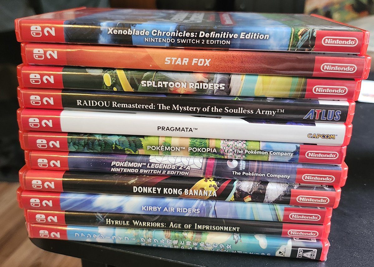 NonsenseTendo's tweet photo. Everyone is sharing their Nintendo Switch 2 game collection. Here's my measly collection of physical games. I got the upgrade packs for the titles I already had on Switch. https://t.co/kt5Y8L8drF
