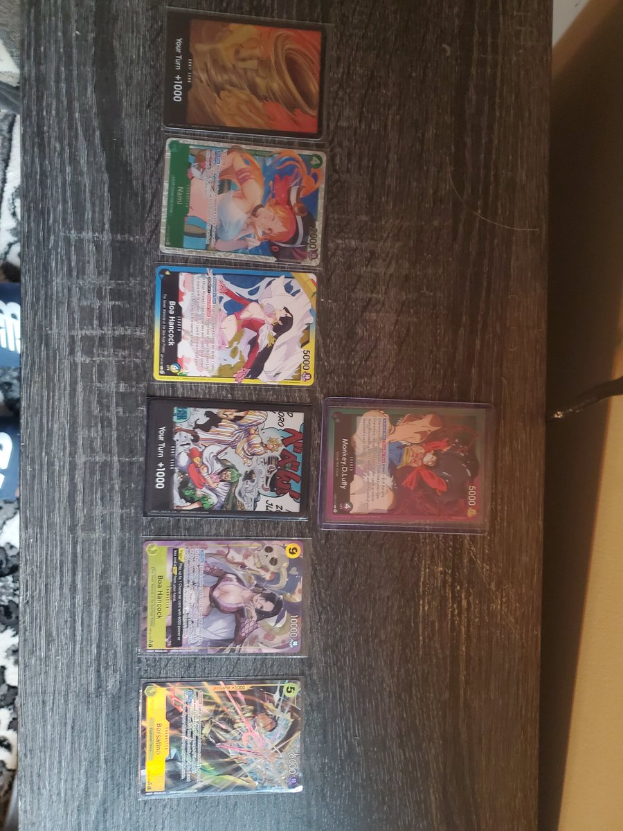 Jurassic_Talk's tweet photo. I started getting into One Piece cards this year. The show is cool https://t.co/jeJu2xWGle