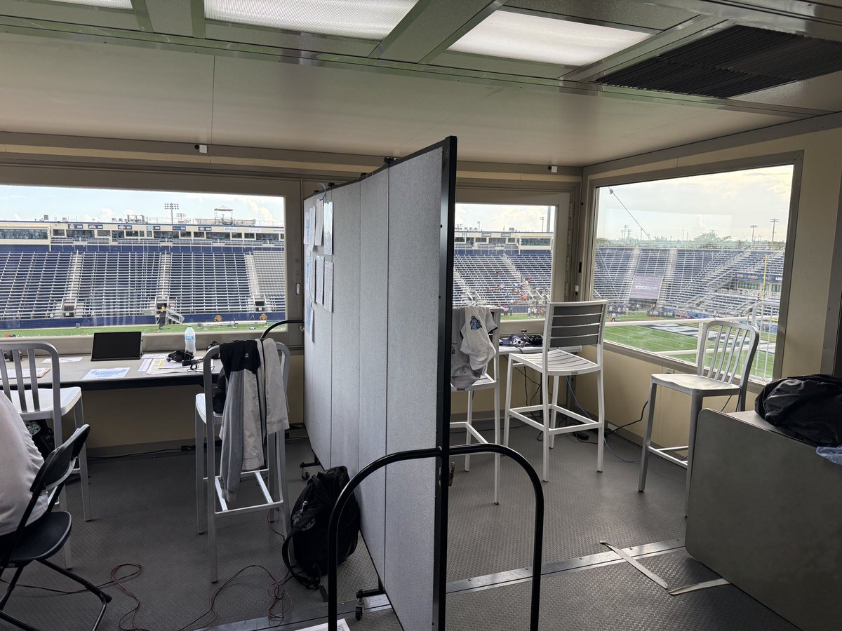 PeckOnSports's tweet photo. In 27 years of calling @UBuffaloFB, this visiting radio setup at FIU is one of the most unique. Radio booth(s) are a standalone prefab building at top of stands. Plus, we have to share it with Panthers radio. Same room. Divider in between. They’ll definitely hear us! https://t.co/c1HU7vpI6O