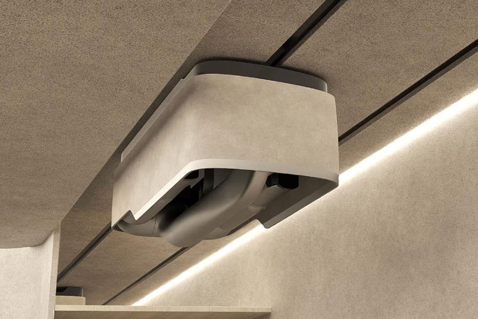 vigram_void's tweet photo. Tokyo startup MW unveiled a wonderfully contrarian approach to domestic robotics: robotic arms built directly into houses, traveling along ceiling-mounted rails rather than walking around on legs. In demonstrations, the system moved groceries, sorted food between pantry and refrigerator, handled laundry and folded a towel; MW wants its first robot-equipped homes on sale in Tokyo in 2028 and eventually targets 10,000 homes annually by 2035.

The company has raised roughly ¥3 billion (~$20M) so far.

I think this idea deserves far more attention than it will probably get.

Humanoids solve an extraordinarily difficult constraint:

Make the robot adapt to an environment designed for humans.

MW flips the problem:

Make the environment adapt to the robot.

A ceiling rail eliminates locomotion, stairs, balance and much of collision avoidance while supplying permanent power and known coordinates.

That could make a $20k fixed manipulator dramatically more useful than a $100k humanoid for many homes.

It's essentially the smart-home concept taken to its logical conclusion: the building itself becomes a robot.