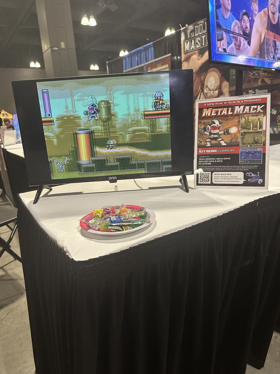 corey_annis's tweet photo. Metal Mack is on display at the @RetroWorldExpo featuring a new trailer! 
@RetrosoftStudio was kind enough to set this up at their booth. Thanks so much! 🤖👍

#ScreenshotSaturday #RetroGaming #MegaDrive #SegaGenesis #NeoGeo #AES #Steam https://t.co/Q1ZZVQtX4O