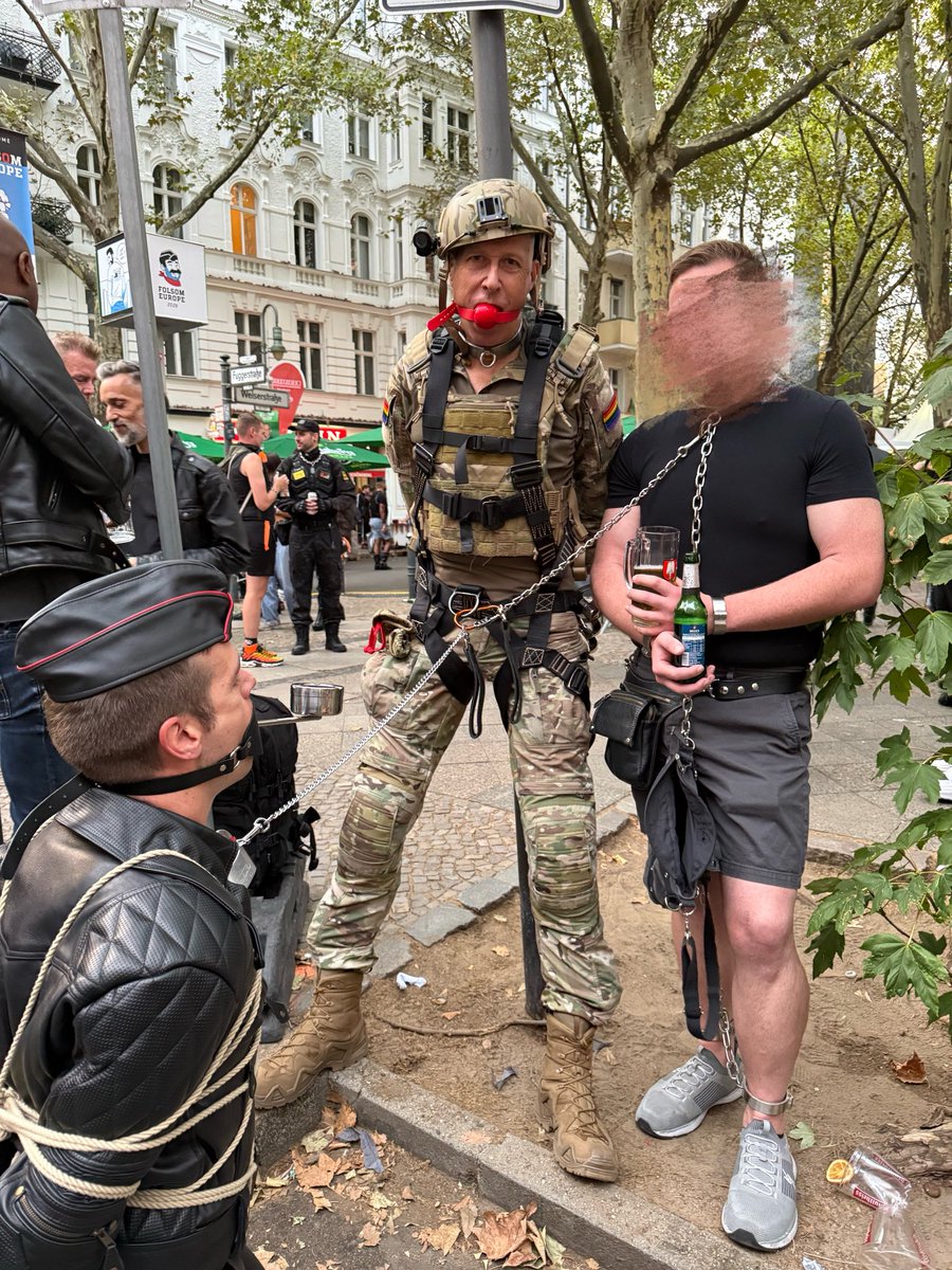 bootedray's tweet photo. #folsom fun continues. Three boys locked by one chain (with My slave as #humanashtray) 
#folsomeurope #folsomberlin https://t.co/c1EQ23G0Z4