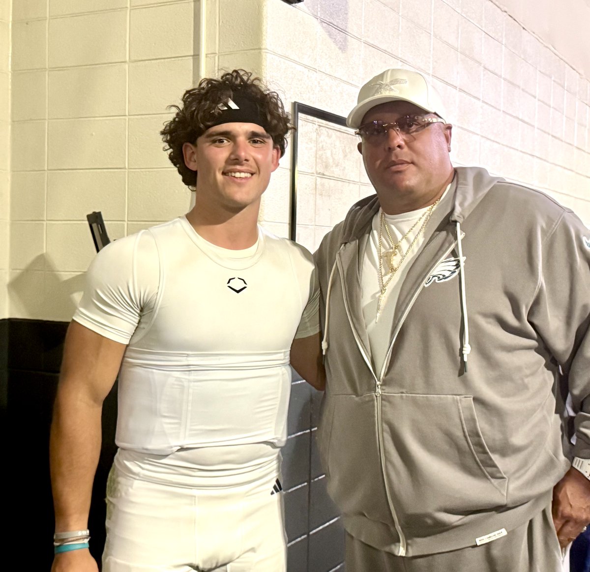 PSUPoorman's tweet photo. Penn State quarterback Rocco Becht and Eagles security chief Big Dom DiSandro met up outside the PSU locker room at Lincoln Financial Field on Saturday after the Nittany Lions defeated Temple, 27-9. https://t.co/xkWHK79jzL
