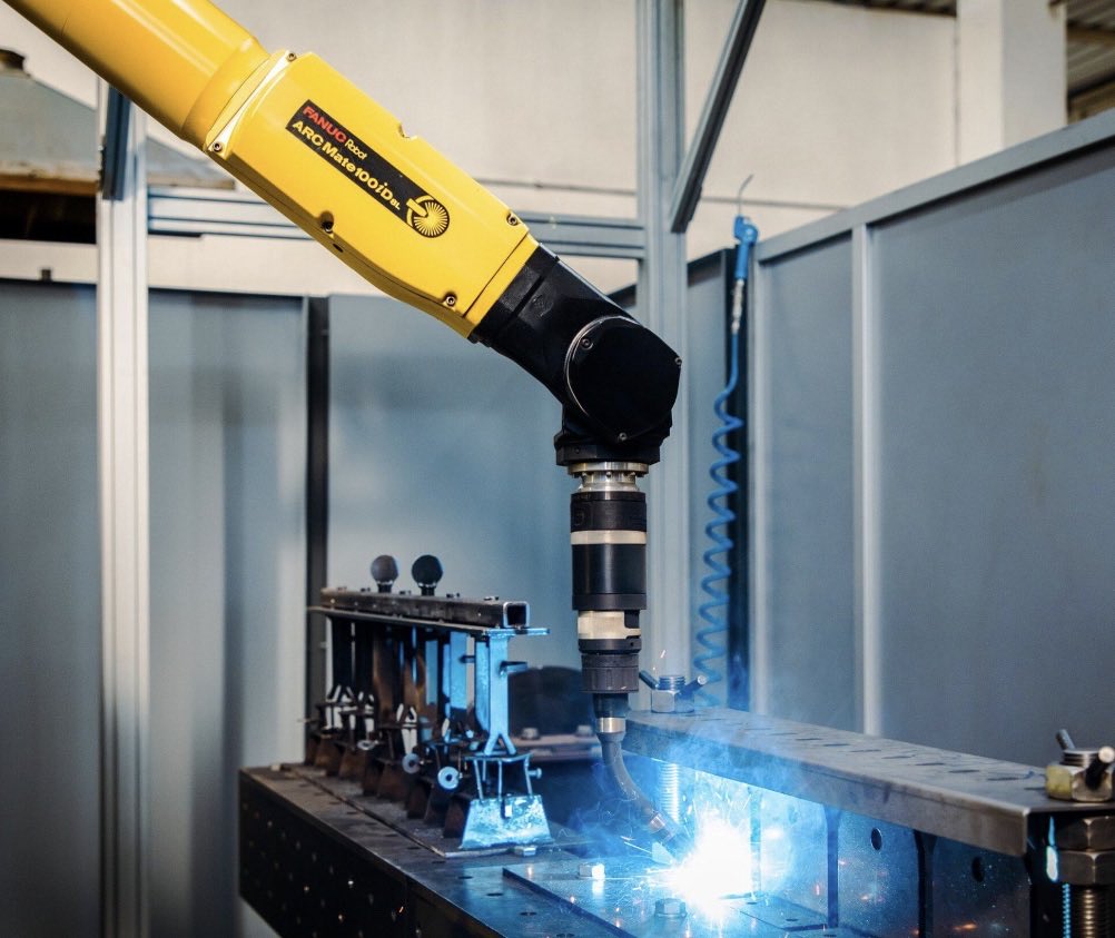 vigram_void's tweet photo. @FANUCAmerica announced its AI Welding Agent on September 11, built with @GoogleCloudTech technology. Instead of an engineer manually programming robot trajectories, the system can read component drawings, generate an arc-welding program and execute it on a FANUC robot; commercial shipments are planned by the end of December. 

Why it matters: Industrial robots have been physically capable of welding for decades. The expensive part is often the engineering surrounding them: interpreting drawings, choosing operations, generating robot programs, validating them and reprogramming whenever the product changes.

AI is beginning to attack that layer.

The emerging workflow looks more like:

CAD/drawing → agent understands task → generates robot program → simulation/validation → physical execution.

If this generalizes from welding into machining, assembly, inspection and material handling, the boundary between engineering software and robot control software starts disappearing.