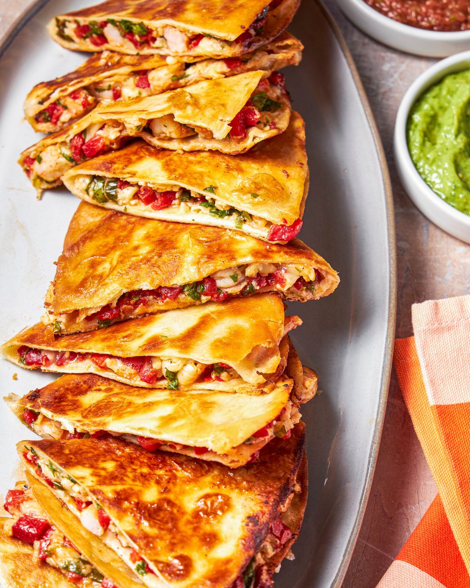 TestKitchen's tweet photo. Gooey inside, crispy outside, quesadillas are an easy go-to for good reason. One of our favs? These Shrimp, Roasted Red Pepper, and Cilantro Quesadillas. https://t.co/O2ImqvSjq1 https://t.co/E0EQHrJmHT