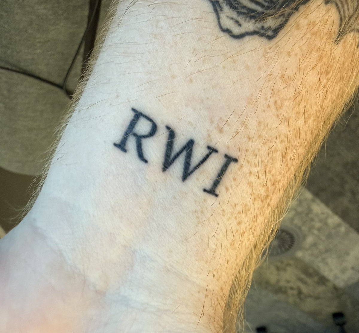 RWIrobinhood's tweet photo. Most people still think $RWI isn’t real, just like most people probably think this tattoo is fake.

We are so early. 😂 https://t.co/jYRQvMuQIX