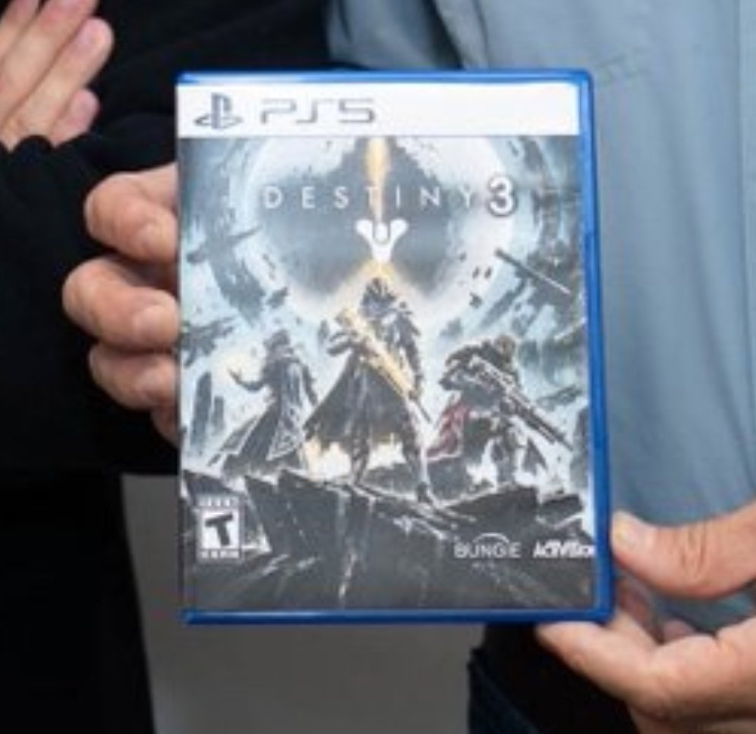 RickKackis's tweet photo. Why on earth are they holding a fake copy of Destiny 3? 💀 https://t.co/8ydxJO3Xlq