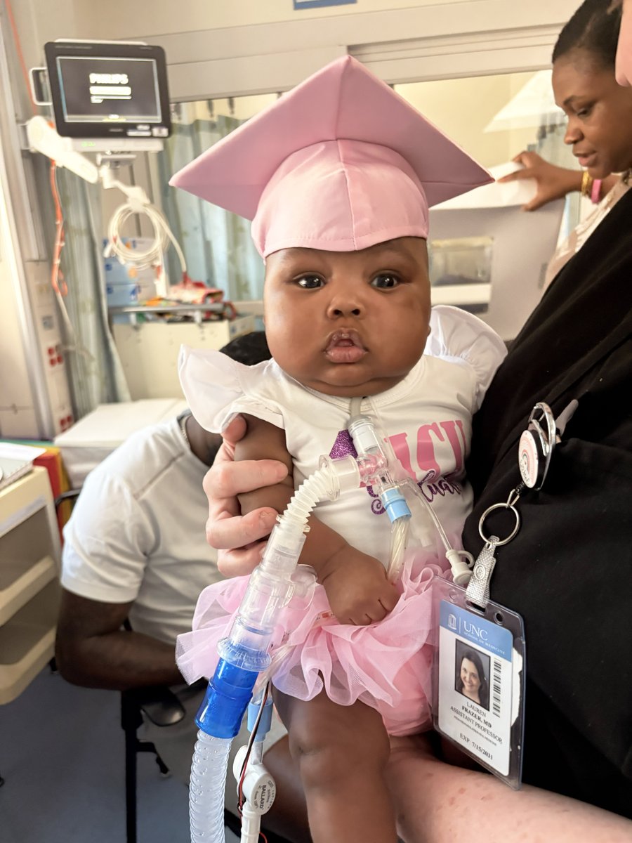 uncchildrens's tweet photo. A very special graduation at UNC Children's Hospital. 💗 

After seven months of NICU care, baby Janouri is headed home! Our teammates and her family came together to celebrate with cupcakes, a pink graduation cap and a special song. https://t.co/kA5HOskQsg