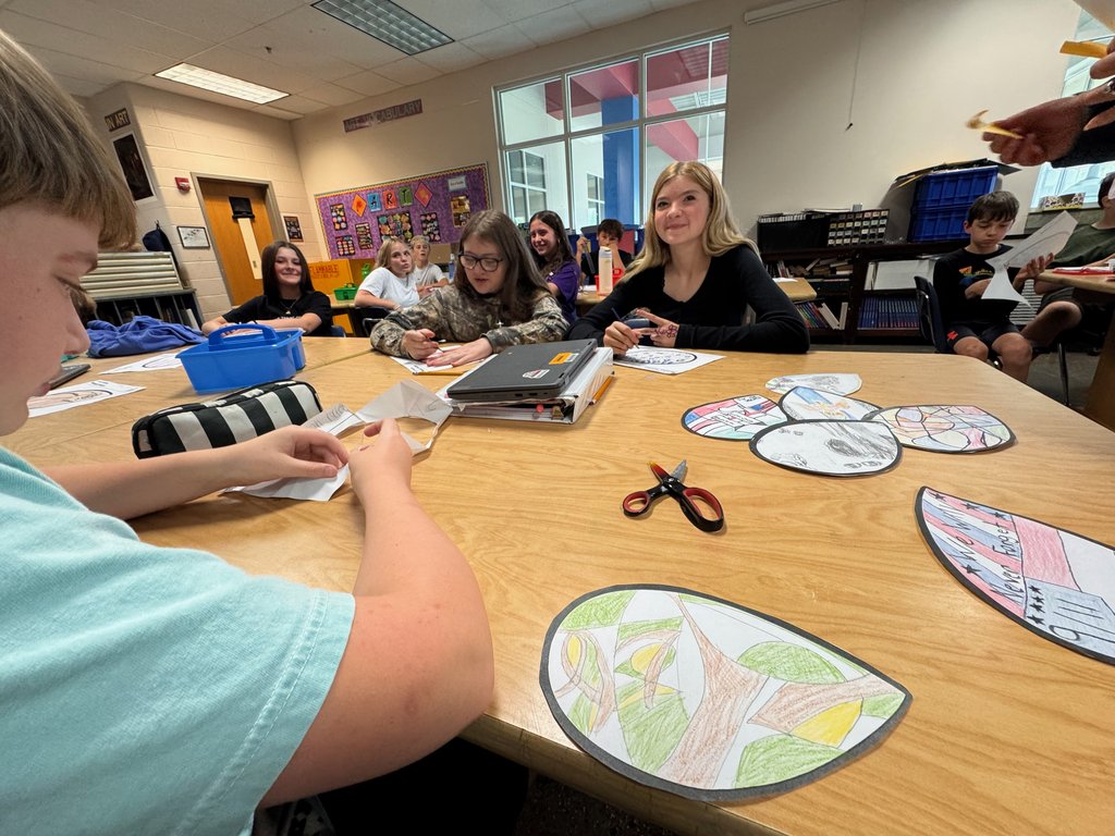 CMSGoBlue's tweet photo. Yesterday, many of our classes had lessons and projects that gave them time to reflect on the events of 9/11.  Students in Mrs. Sigmon's classes created art with the "Feathers of the Phoenix" lesson from the 911 Memorial focusing on hope, resilience, and unity. https://t.co/KICxM5l2xr