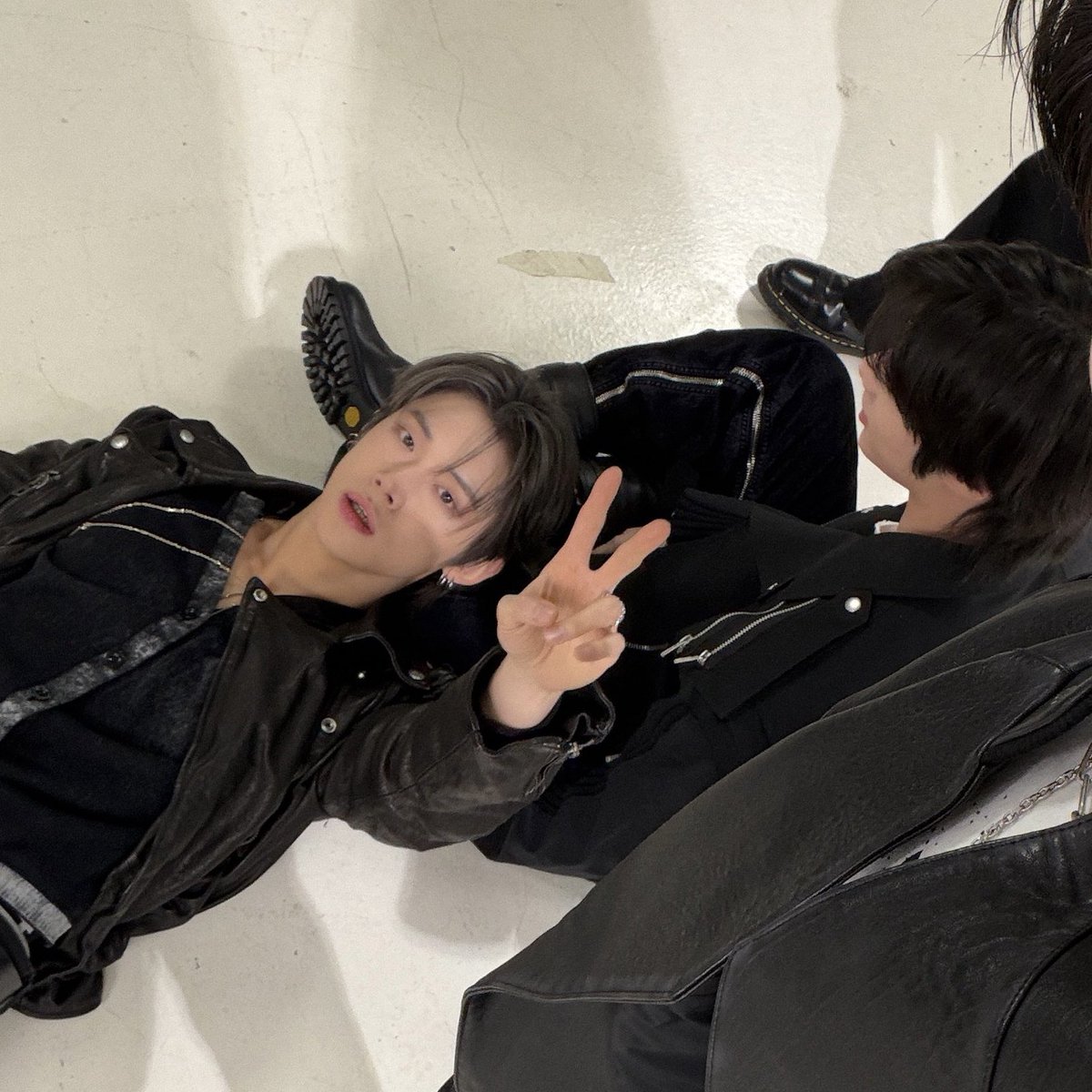 913kkyu's tweet photo. yeonjun’s head on beomgyu’s lap from the moacon merch photoshoot😭❤️‍🩹 https://t.co/zEvS2xuK9e