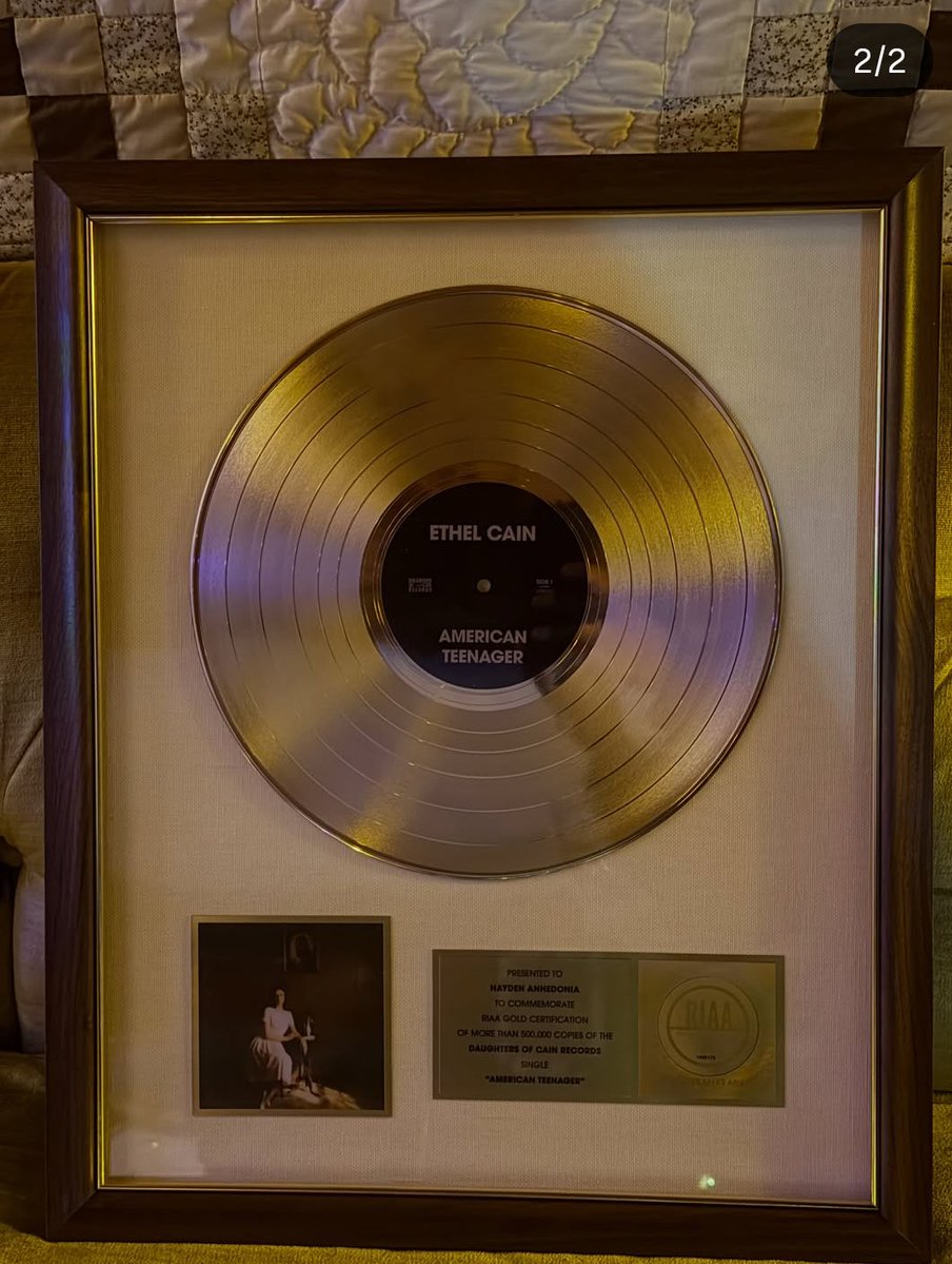 SpotifyEthel's tweet photo. Ethel Cain STUNS as an official Certified RIAA artist as she shows off her achievement for "American Thong". https://t.co/2i6u1k6hVz