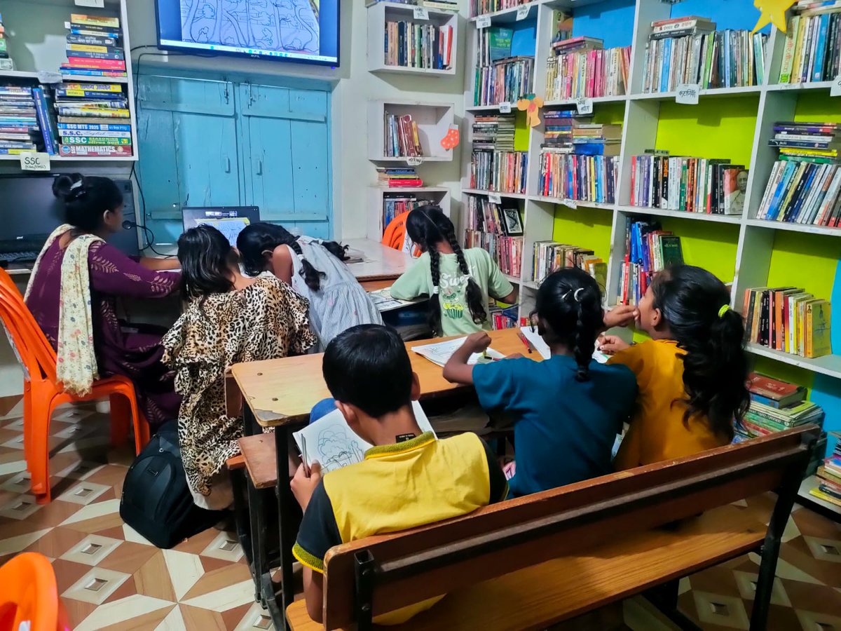 BansaLibrary's tweet photo. What happens when a child in Bansa wants to learn something that isn’t available around them?

At Bansa Library, we try not to let the answer be, “You can’t, because there’s no one here to teach you.”

Recently, a group of our young members came together for an art session led by one of our volunteer teachers based in Bihar. Through a digital connection, they were able to learn, create, ask questions and spend time exploring art together.

The teacher was in Bihar. The children were in Bansa. And yet, for that hour, distance hardly mattered. This is one of the things we love about the idea of a community library. It can connect a village to people, ideas, skills and experiences that may otherwise remain out of reach.

A child may come to the library looking for a book, but end up discovering art. Another may want to learn computers. Someone may be curious about a language, a craft, a story, a science experiment or simply something they have never encountered before.

We don't believe a library should decide that some interests are more worthy of space than others.

There is also a deeper principle behind this. Access to knowledge, information, learning and culture should be treated as a right, not as a privilege available only to children who happen to live in cities or come from families who can afford additional opportunities.

A rights-based approach means asking a simple question: What does a learner need to explore their potential, and how can we help make that access possible?

Sometimes the answer is a book.
Sometimes it is a computer.
Sometimes it is a quiet corner.
And sometimes, it is a teacher sitting hundreds of kilometres away, willing to spend an hour drawing and learning with a group of children.

The library may be located in Bansa, but the learning it enables does not have to be limited by Bansa's geography. That, to us, is what a community library should be, a space where curiosity is welcomed, access is expanded, and a child's imagination is never told that something is “not for them.” 

#RightToRead #CommunityLibrary #BansaLibrary
