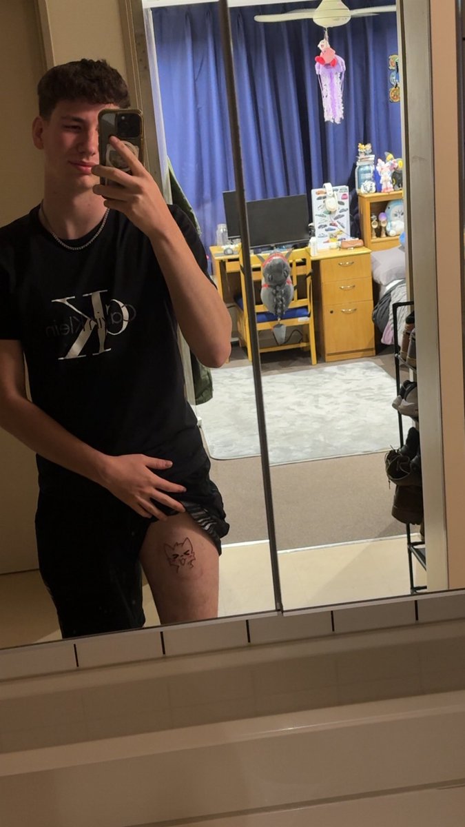 ItsDoxxy's tweet photo. He lives on my thigh now 

 #Boykisser #furry #tattoo https://t.co/9m0hrs9XV9