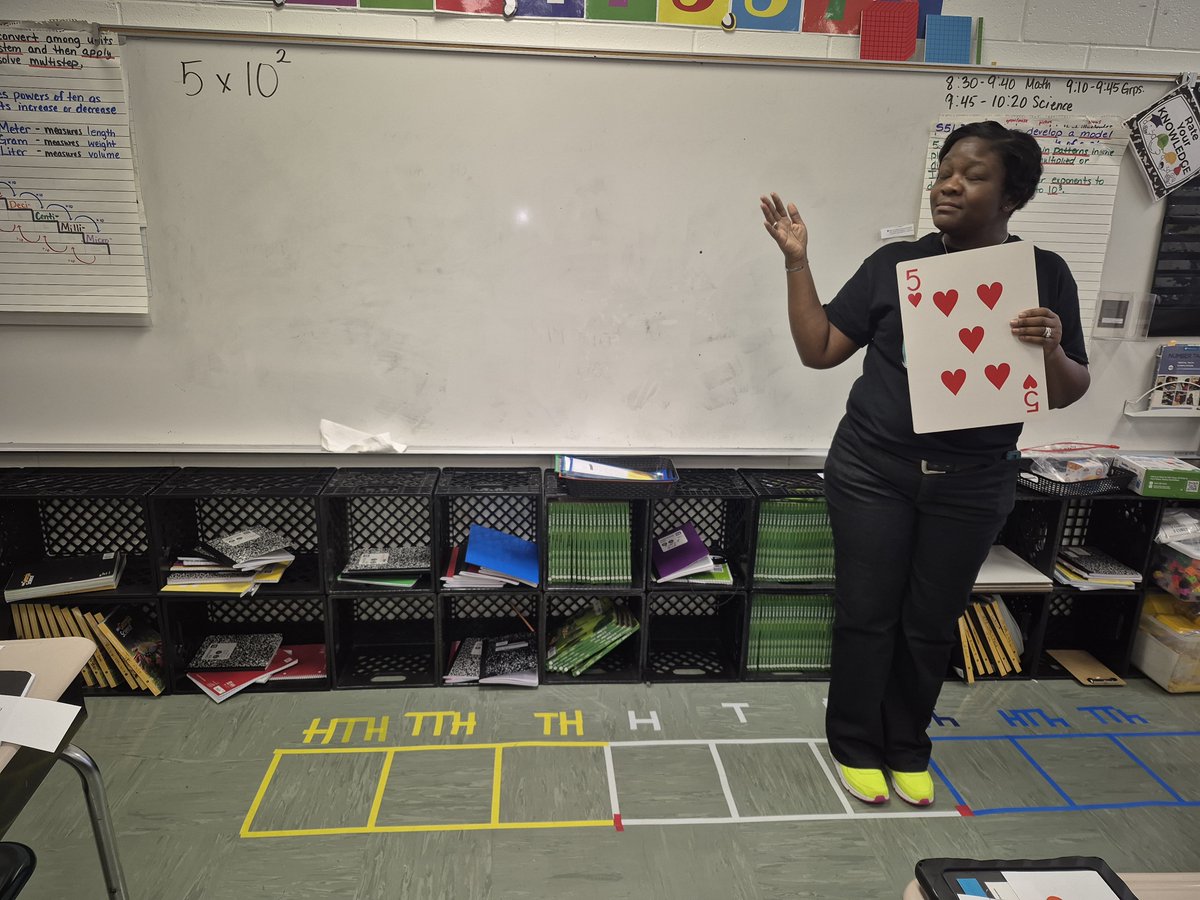 FreesEdWorld's tweet photo. Our Teacher of the Year, Ms. Early is doing what great teachers do! They make learning come alive! 🌟 Students explored place value and powers of ten through meaningful, engaging math experiences that made big concepts click. @BethlehemES_HCS @Math_HCS https://t.co/U2X530yuOt