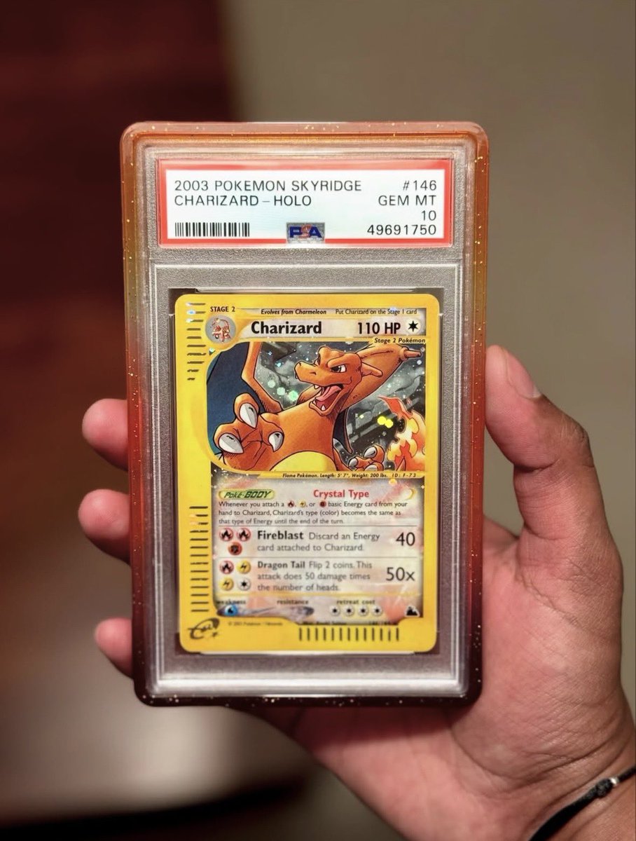 astro_degens's tweet photo. GIVING AWAY this $50,000 2003 Skyridge Crystal Charizard PSA 10 GEM MINT 🐉

One of the most iconic and sought-after Charizard cards ever printed.

Valued at over $50,000 USD. 

If this legendary grail finds its way into the collection of someone who truly loves Pokémon, then it’s going to the right home.

Just like, repost & reply with your favorite Charizard card for your chance to win.

Good luck, Trainers! 🍀