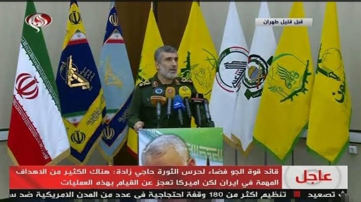 HExtremous1's tweet photo. Quick quiz: 

Can you spot the Houthi and Zainabiyoun flags behind IRGC Brig Gen Amir Ali Hajizadeh? 

Bonus points if you can explain why they’re there while Iran insists it has nothing to do with the Houthis. https://t.co/YR9BQqY6cD