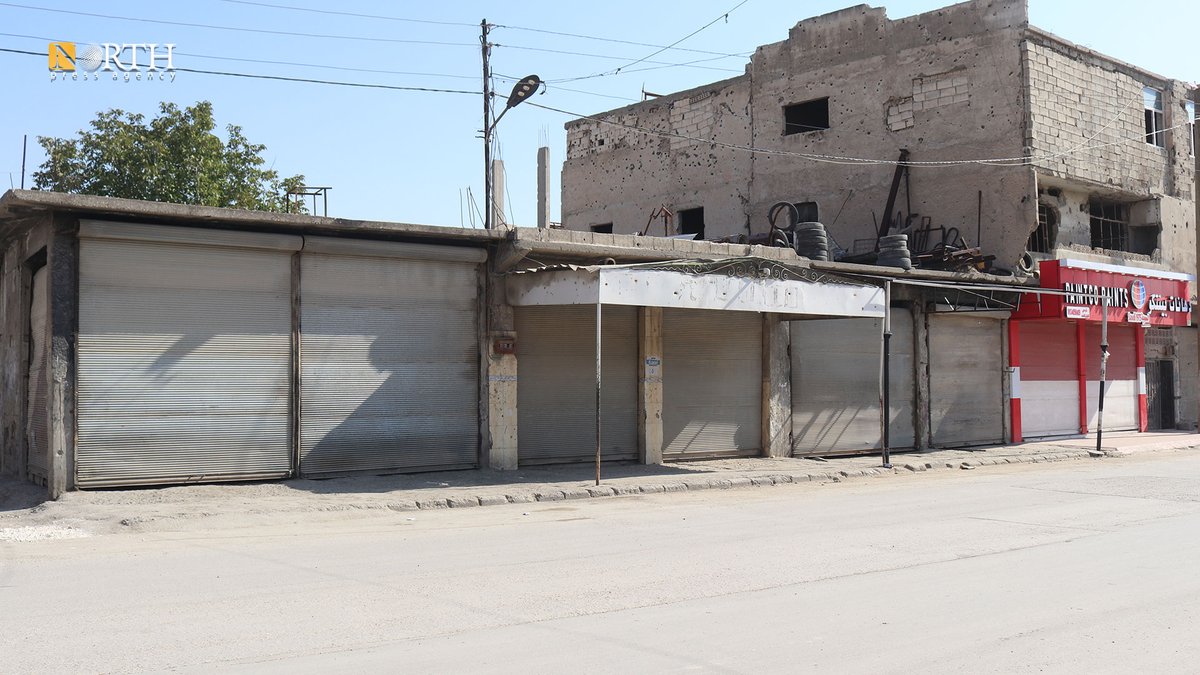 NPA_English's tweet photo. #Kobani in northern #Syria declares a general closure in mourning for the victims of a prison fire, with businesses and public institutions shutting down to honor those who lost their lives. #Kurds https://t.co/1WYn0sppfy