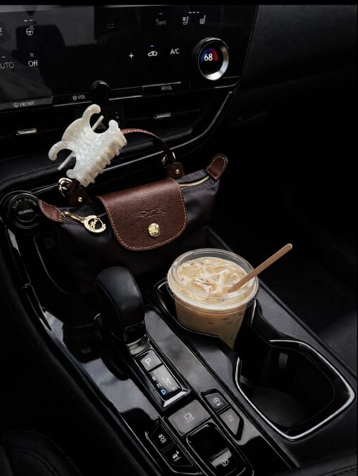 _missbanter's tweet photo. coffee in car aesthetics https://t.co/88CsH6qVpp