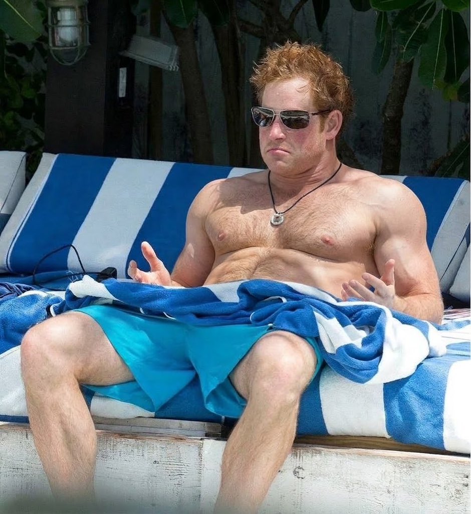nzubegoodluck80's tweet photo. Shirtless Prince Harry shows off his ripped physique on a Beach. https://t.co/76hhxH9w1y