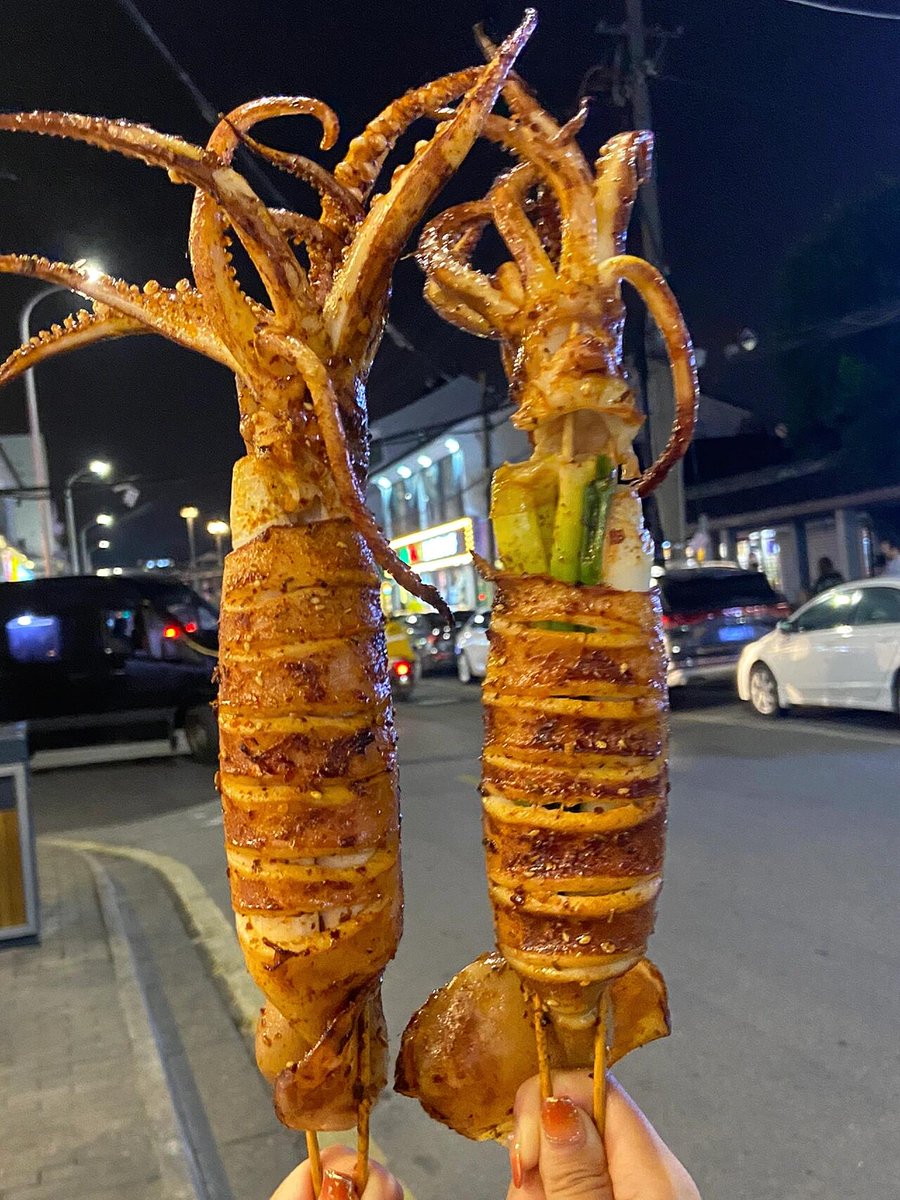 LBrooks14944's tweet photo. Grab a warm crispy fried squid stick from the street stall—crunchy on the outside, tender inside, perfect for a quick roadside bite!， https://t.co/6a6ajoH7qE