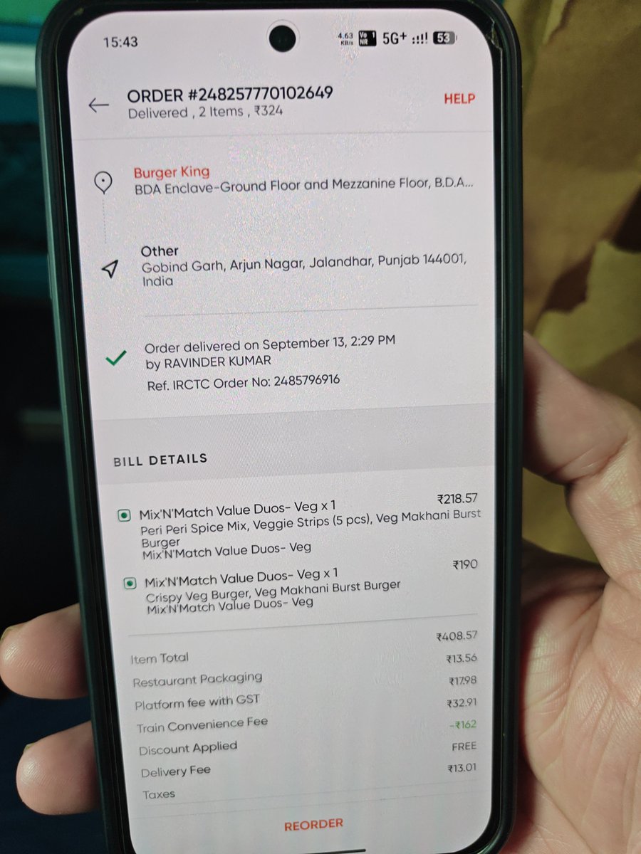 Gauravmad4u's tweet photo. We received a wrong order from Swiggy on our train at Jalandhar City station on train 14505 today. The video is what we received and the screen shot is what we ordered. Very disappointed that we ordered veg burger and received Non veg . And customer care not responding. https://t.co/0fMFe96N5e