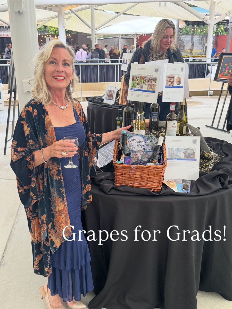 KevinBramuchi's tweet photo. My silent auction basket for Rotary Club's Grapes for Grads: my book, Two Cats, a Mermaid and the Disappearing Moon, plus Moon X, Cattoo, and Cosmic Kitty wines. A magical Laguna Beach adventure for all ages. Auction ends Wednesday. https://t.co/qt9M62irUi