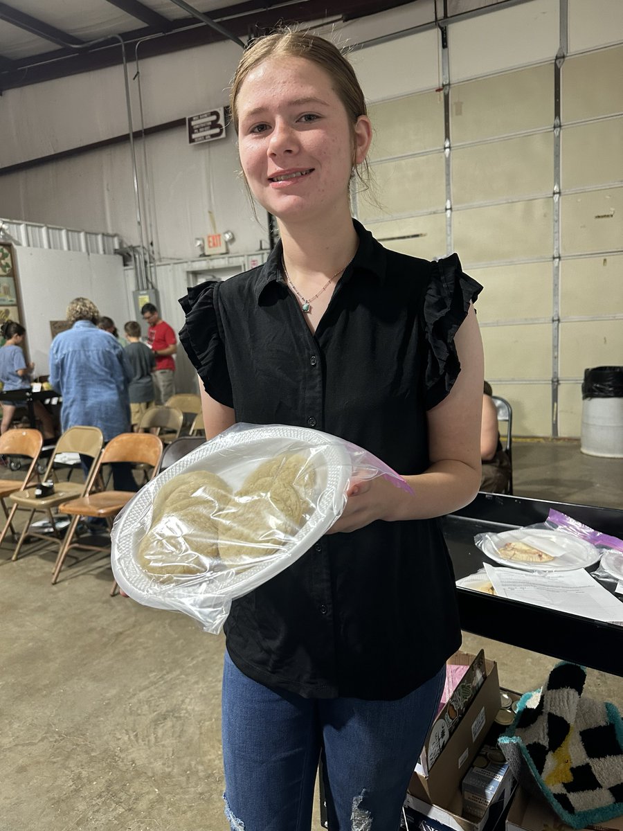 AginArk's tweet photo. Carleigh, 14, a White County @Arkansas4H member, poses with her plate of cookies to be entered in a White County Fair competition.
Thanks to @SherriSanders11 for the photo!
#CountyFairTime https://t.co/S2mKnuTS0l