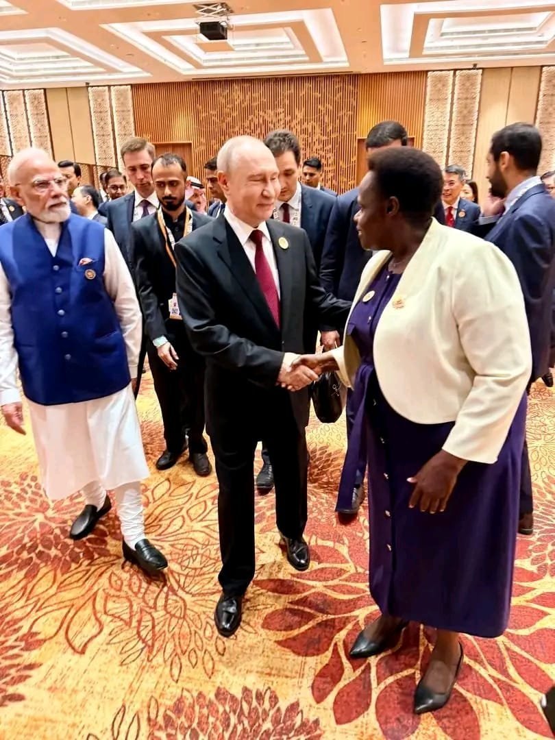 UGHighCommND's tweet photo. Day 2 of the 18th BRICS Summit 

H.E the Vice President joined other Heads of State/ Heads of Delegation for a Family Photo and thereafter delivered Uganda's statement during the Open Session “Resilience, Innovation, Cooperation and
Sustainability: Shaping the Future for Inclusive Global Growth”