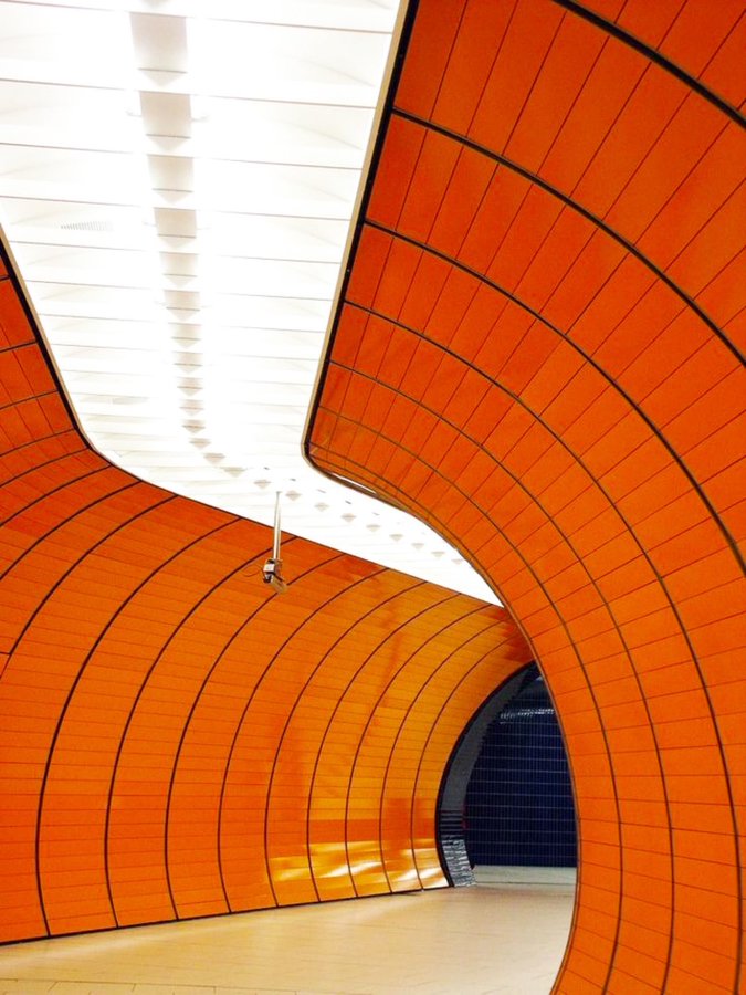 SciFiArchives's tweet photo. The striking orange interior of the Marienplatz U-Bahn station in Munich, Germany. https://t.co/VqqUC5HXyc