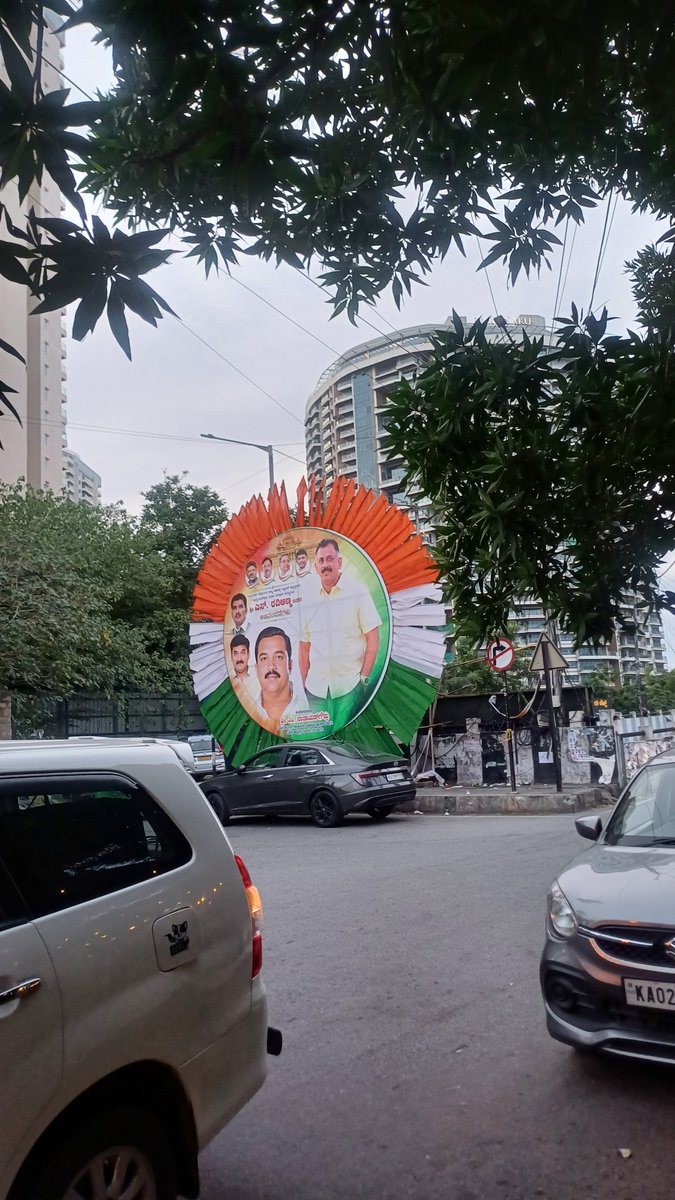 Amarthya1124's tweet photo. I have seen 3 of these huge cutouts for whoever this is?? With photos of @DKShivakumar and more people huge 20ft ones!!
1st one at Rameshwaram cafe. Dr Rajkumar rd and other Goraguntepalya signal.

@ICCCBengaluru @krishnabgowda @GBA_office  lets see what you do.
@ChristinMP_ https://t.co/viFZ6pkWqF