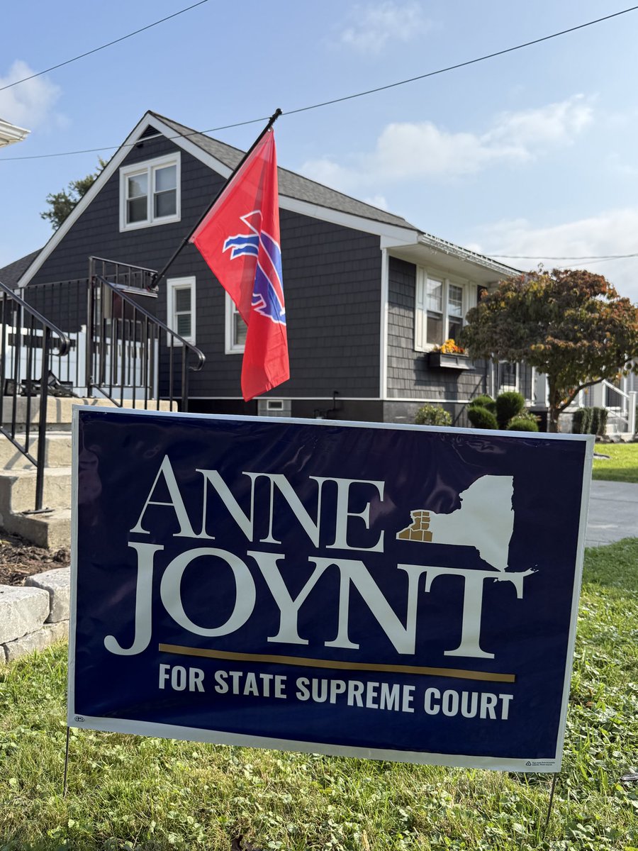 JoyntforJustice's tweet photo. The signs are up, the Bills flag is flying and we’re ready for game day! 🏈❤️💙

Go Bills—and if you’d like an Anne Joynt for State Supreme Court lawn sign, go to https://t.co/0YLtT8f9tR https://t.co/do6JSkwHuq