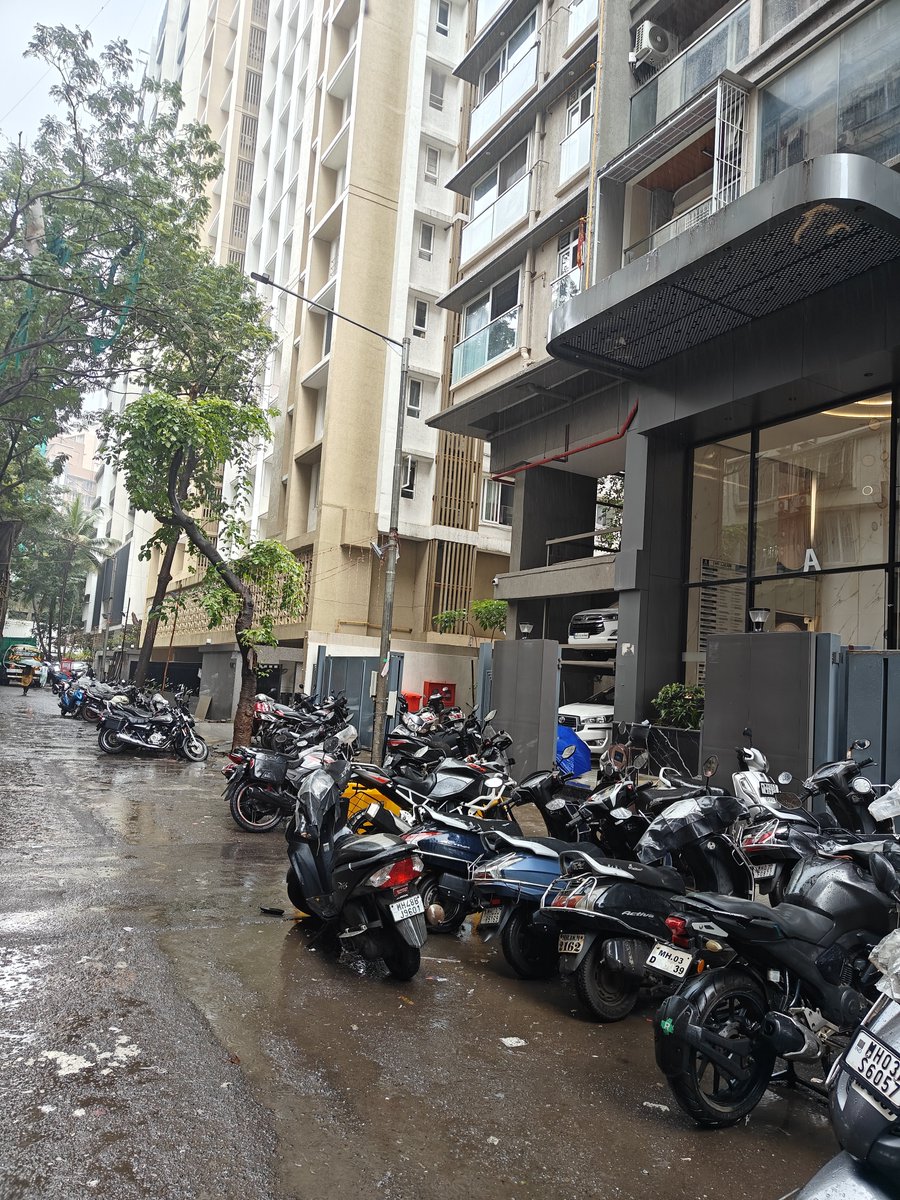 malays05's tweet photo. 1/2
@mybmc @mybmcWardN @ParagShahBJP
This is the situation near Vallabhbaug Ext, after Sai Baba Mandir, Ghatkopar East.
Bikes belonging to residents of Gurukrupa Agam A &amp; B Wing, 149 are parked right up to the road, in 2–3 layers, leaving virtually no space for vehicles to pass. https://t.co/cwig81I9Ow