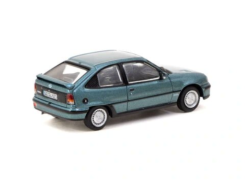 rayoardiente's tweet photo. A legend in 1/64 scale. The Opel Kadett GSI by Tarmac Works features a diecast body, rubber wheels, authentic badges, interior, underside and metallic red or green finishes. Limited production model. https://t.co/U6aqLvfbuM