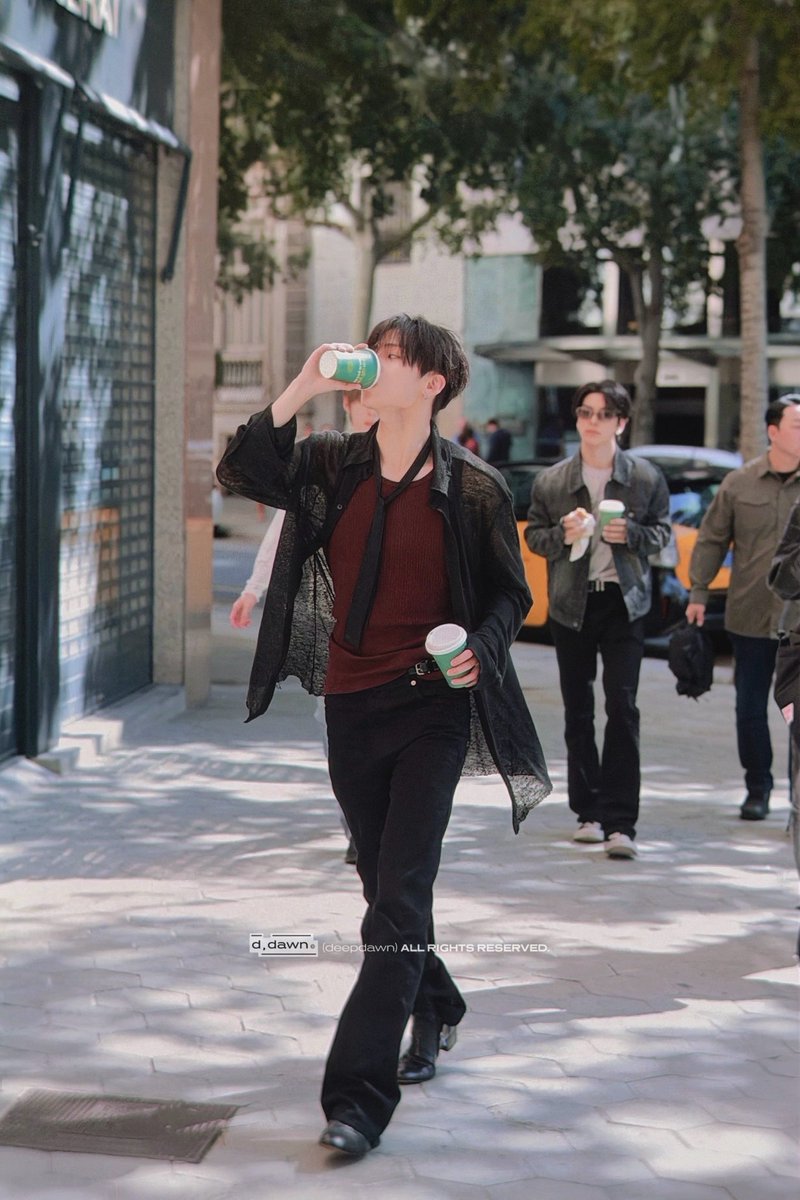 eclairswon's tweet photo. look at how sangwon just casually turned a random street in barcelona into his runway... our fashionista 😩🫶🏻 https://t.co/xe0zF5mGjo