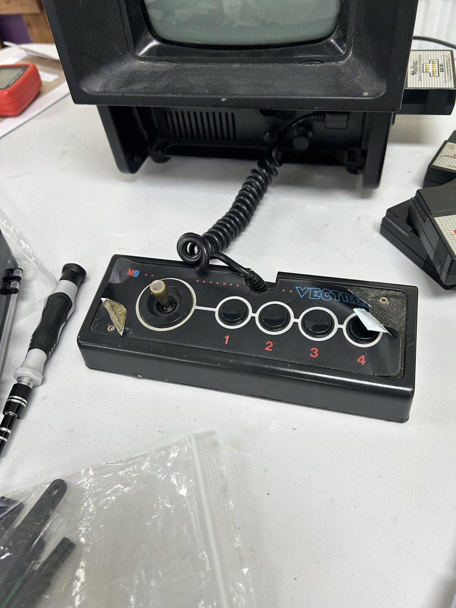 2j4ez's tweet photo. Controller is back together just need to remove the original sticker clean up the leftover sticky crap and replace it with a new sticker and all should be good :-) #vextrex #retro https://t.co/3sKLWqdroc