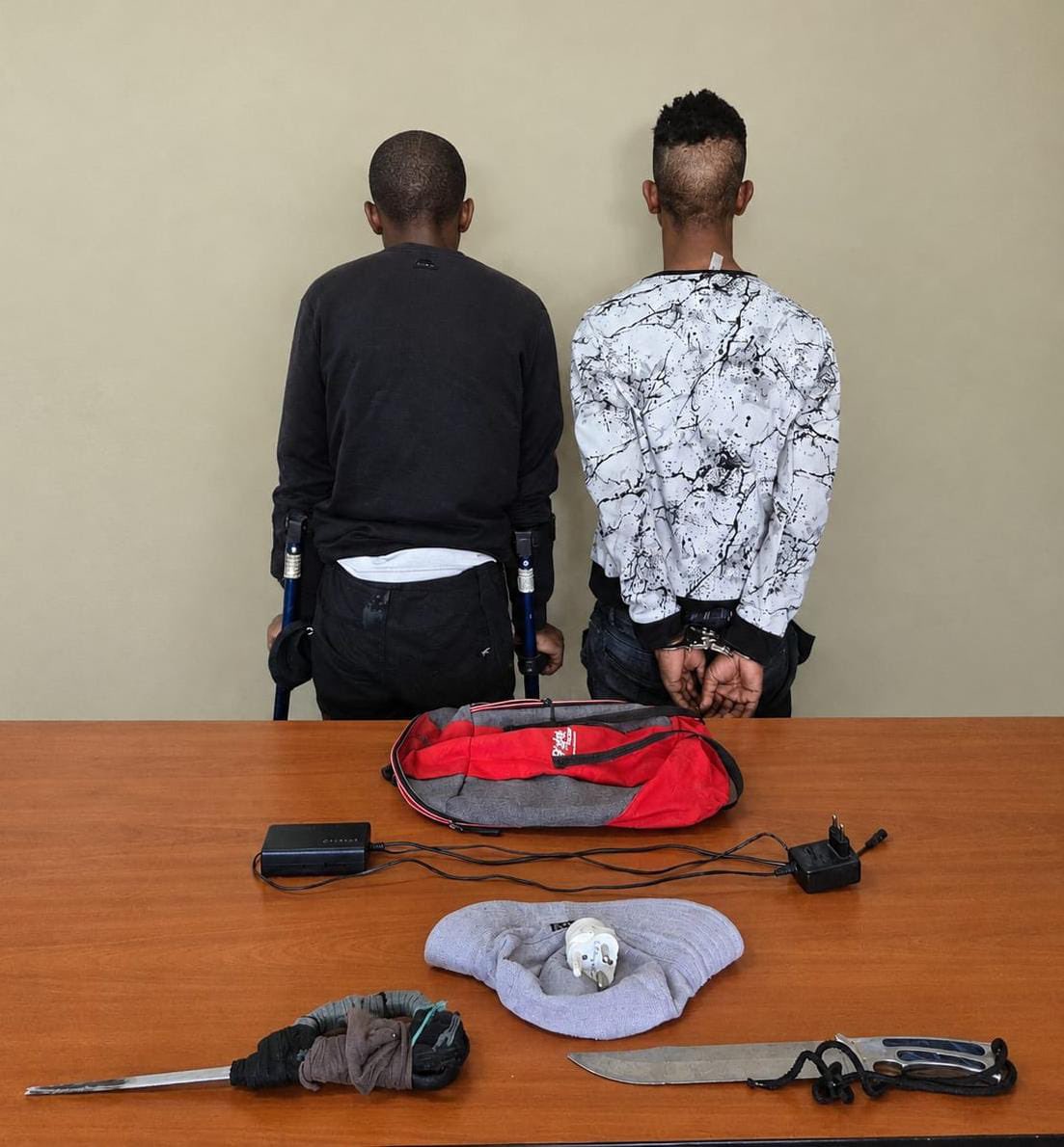 SAPoliceService's tweet photo. #sapsFS [ALLEGED ROBBERY SUSPECTS TRACED AND APPREHENDED IN THABONG]

The Welkom #AntiGangUnit has arrested two males aged 30 and 32. The alleged suspects were #WANTED in connection with a robbery case that was recently reported in Thabong.

On Sunday, 13/09, members attached to the Welkom AGU were conducting crime duties when they received information on the whereabouts of one of the wanted suspects. The alleged suspect was subsequently found and arrested.

Further investigations led police to the second suspect in Oppenheimer Park, Thabong. During the second arrest, police recovered a laptop charger, backpack, a hat and an adapter plug that were reported stolen during the robbery. Police also seized two big knives presumed to have been used during the commission of the crime.

The recovered items were positively identified by the complainant. The third alleged suspect is yet to be arrested.

According to information, on Saturday, 05/09, the complainant was on his way to his place of residence when he was accosted by three males. Two of them were allegedly wielding knives and attempted to stab him before robbing him of his belongings.

A case of robbery with a weapon other than a firearm was registered for further investigation.

The two arrested suspects are expected to appear before the Welkom Magistrate’s Court soon.

#fightingcrime #TrioCrimes SG
https://t.co/Ve7tq6GC6j
