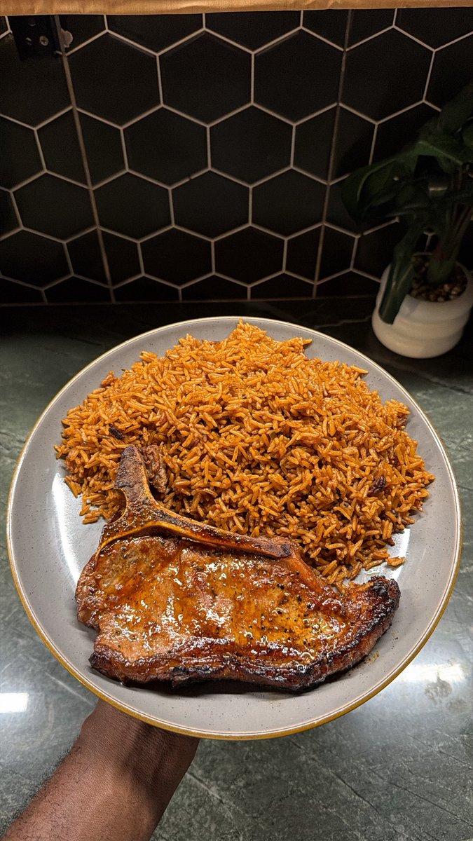 alhajitheozzzy's tweet photo. There is rice at home Sunday 😋 coconut jollof rice with juicy TBone https://t.co/UdUQn4DSy7