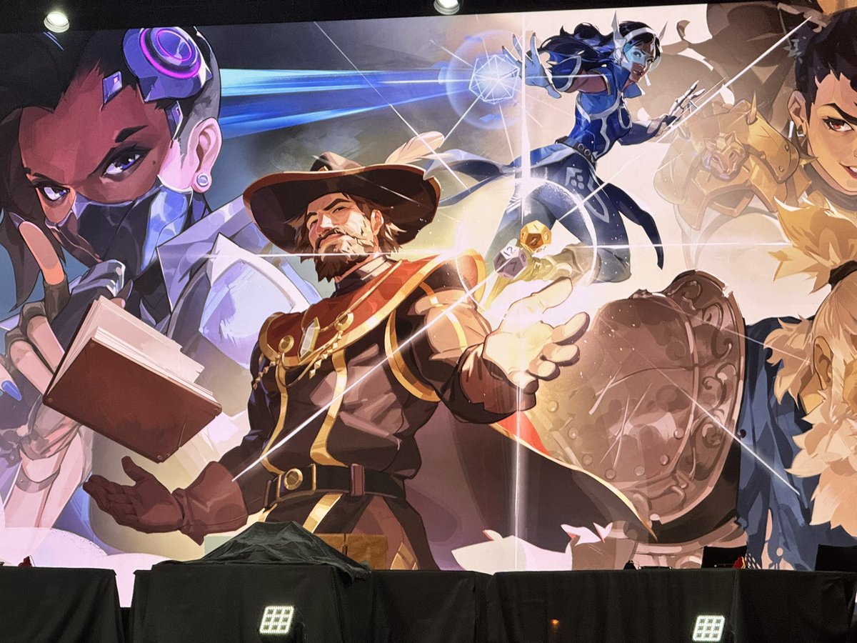 destructoid's tweet photo. One of the GOATs has taken the stage for a fun Overwatch tabletop adventure. Itβs @matthewmercer and #Questwatch time here at #BlizzCon! Several voice actors are in character as their OW counterparts. https://t.co/bRBsXxocKk