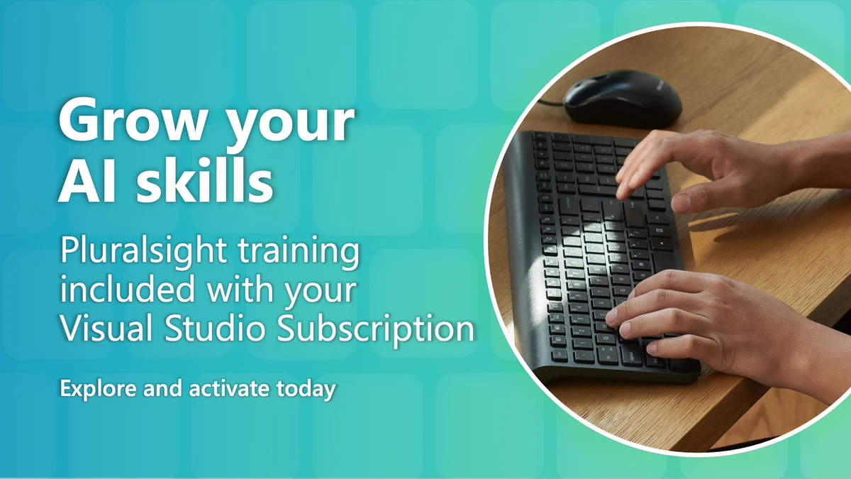 A person using a black keyboard with both hands, placed on a wooden table. The background features teal and white colors. Text reads: 'Grow your AI skills. Pluralsight training included with your Visual Studio Subscription. Explore and activate today.'