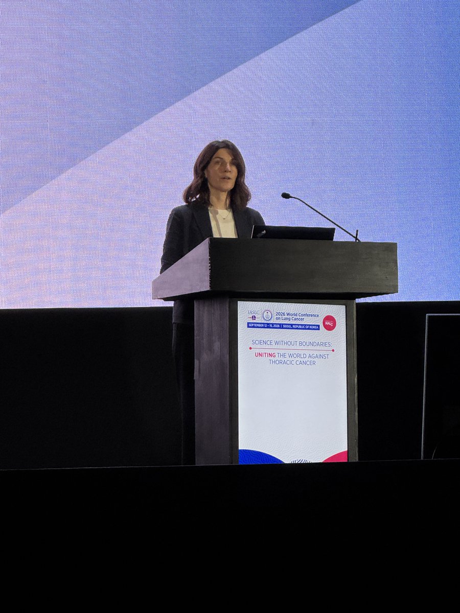 Dr. Julia Rotow presenting DESTINY-Lung04 primary results at the WCLC 2026 Presidential Symposium podium in Seoul