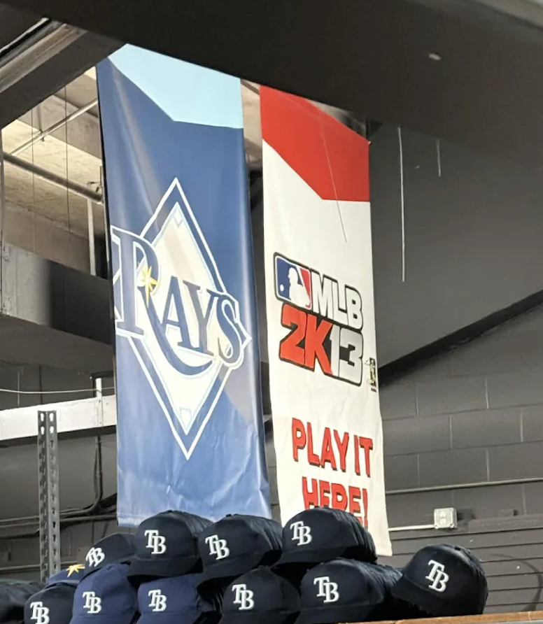 RaysTheRoofTB's tweet photo. In the bowels of Tropicana Field, there's still a MLB 2K13 banner hanging up

Shout out David Price 🗣️🗣️ https://t.co/1tmGMBOWH4