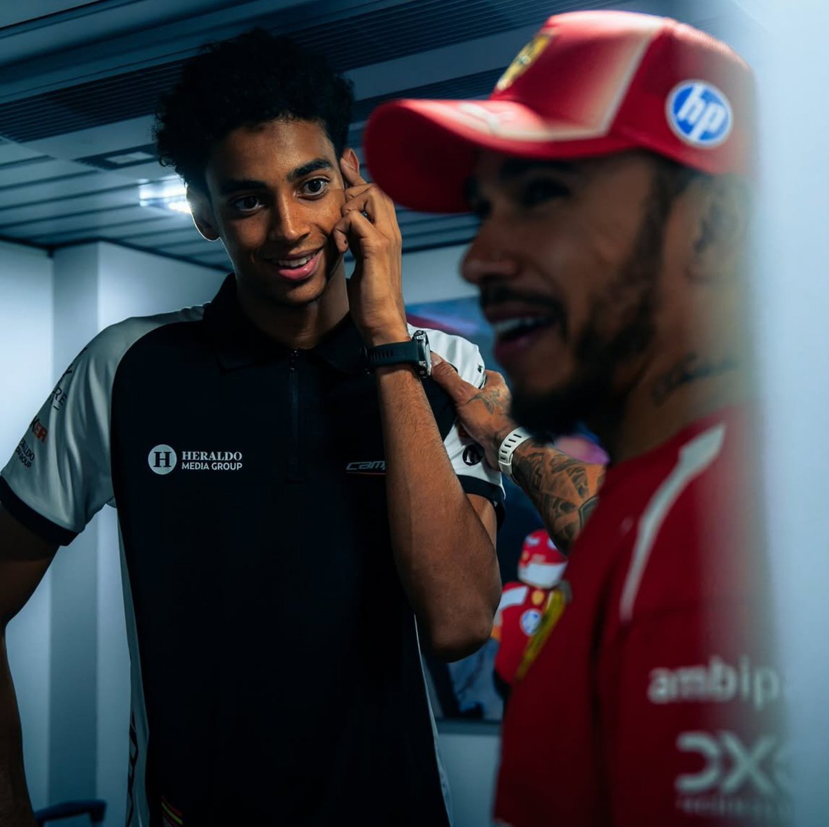 IgboHistoFacts's tweet photo. Lewis Hamilton went to congratulate F3 champion Ugo Ugochukwu. 🥰🫂 https://t.co/WheTPcidWx