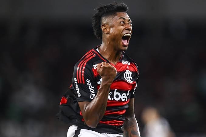 BrunoGuimaLopes's tweet photo. "Minha única vaidade é ver o Flamengo vencer."
Ronaldo Angelim (2011).

"Estou aqui para servir o Flamengo." Bruno Henrique (2026)

Dois ídolos separados pelo tempo mas unidos pelo amor ao clube. https://t.co/fVfaveBdQX