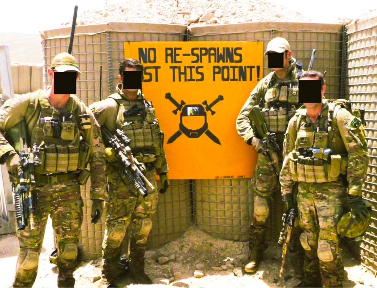 specialopsmag's tweet photo. Australian soldiers pose next to a gaming inspired "No Respawns Past This Point!" sign at a patrol base in Afghanistan, 2011. https://t.co/DxBD1hFiYx