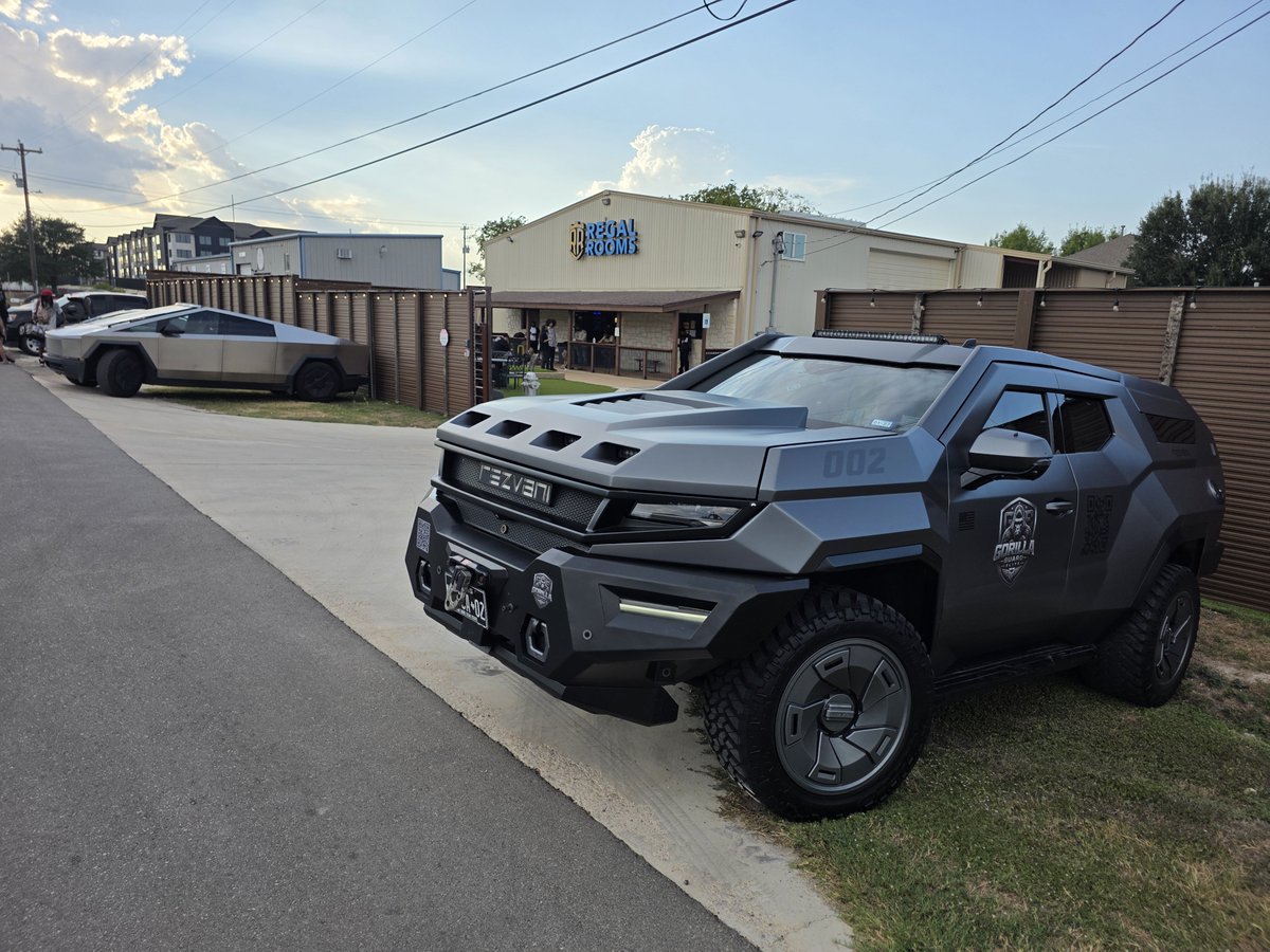 AustinRezvani's tweet photo. #Cybertruck &amp; #Rezvani Vengeance team up to stand guard at the gate of @regalroomsatx https://t.co/ghWbkPqECK