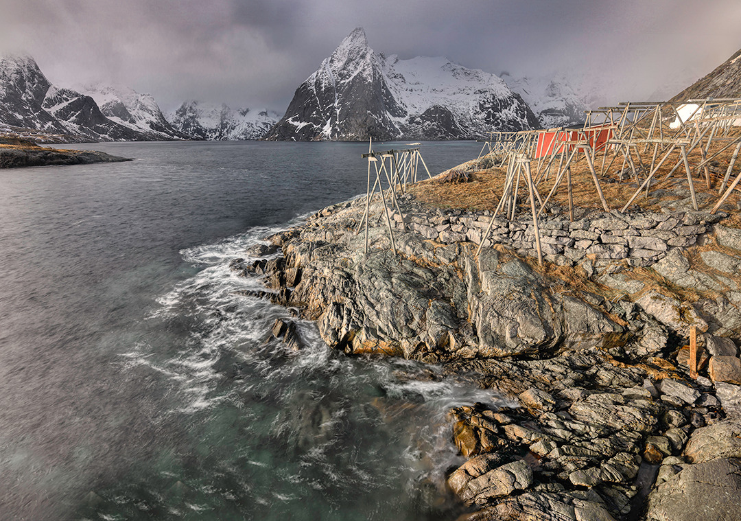 StarrForss's tweet photo. A stormy day in Hamnøy on the Lofoten (Northern Norway), a rare sunbeam lits up the wild rocky coast. øy https://t.co/ioMyeTUr5e