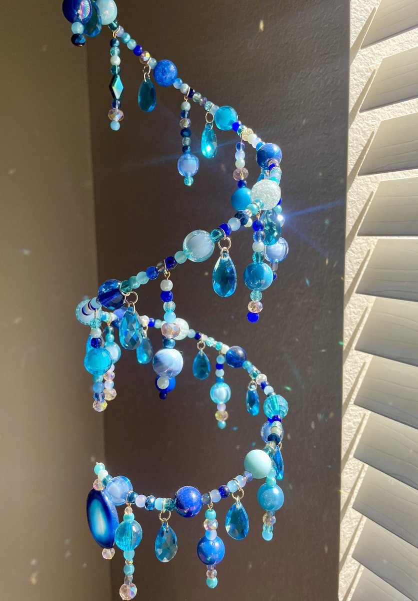 WarmAndCozyCo's tweet photo. 💙✨ Imagine this hanging in a sunny window…

This extra-large blue suncatcher is handmade with tons of beautiful blue beads and catches the light to add a little sparkle + color to your space. 🌈☀️

Only one available at https://t.co/wX4sUfcRFe

#Suncatcher #Handmade #Etsy https://t.co/mYCyz3xf6P