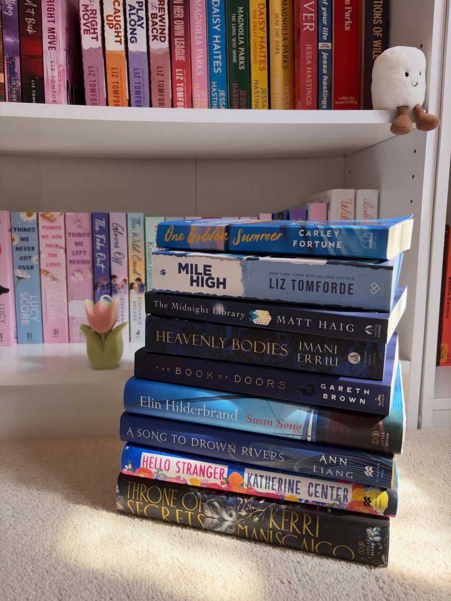 FernandoFerre39's tweet photo. Monday blues. It’s been a while since I’ve done a classic book stack, and this little blue Monday one felt perfect. What’s everyone reading? I’m rereading The Irresistible Urge to Fall For Your Enemy and loving it even more the second time. https://t.co/AIdnH5vfPf
